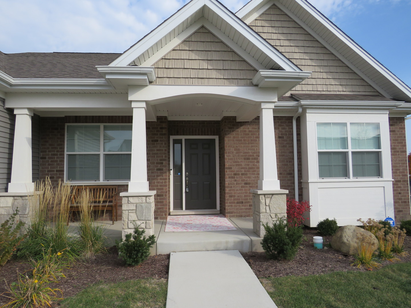 21407 Bay Tree Court Shorewood, IL 60404 - Photo 15 of 53 a front view of a house with garden
