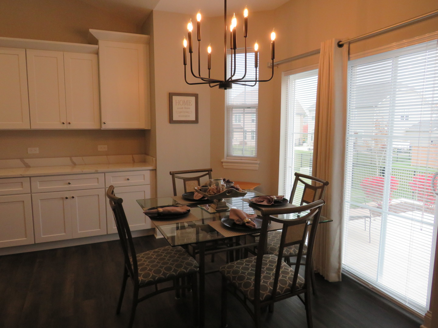 21407 Bay Tree Court Shorewood, IL 60404 - Photo 16 of 53 a view of a dining room with furniture and window