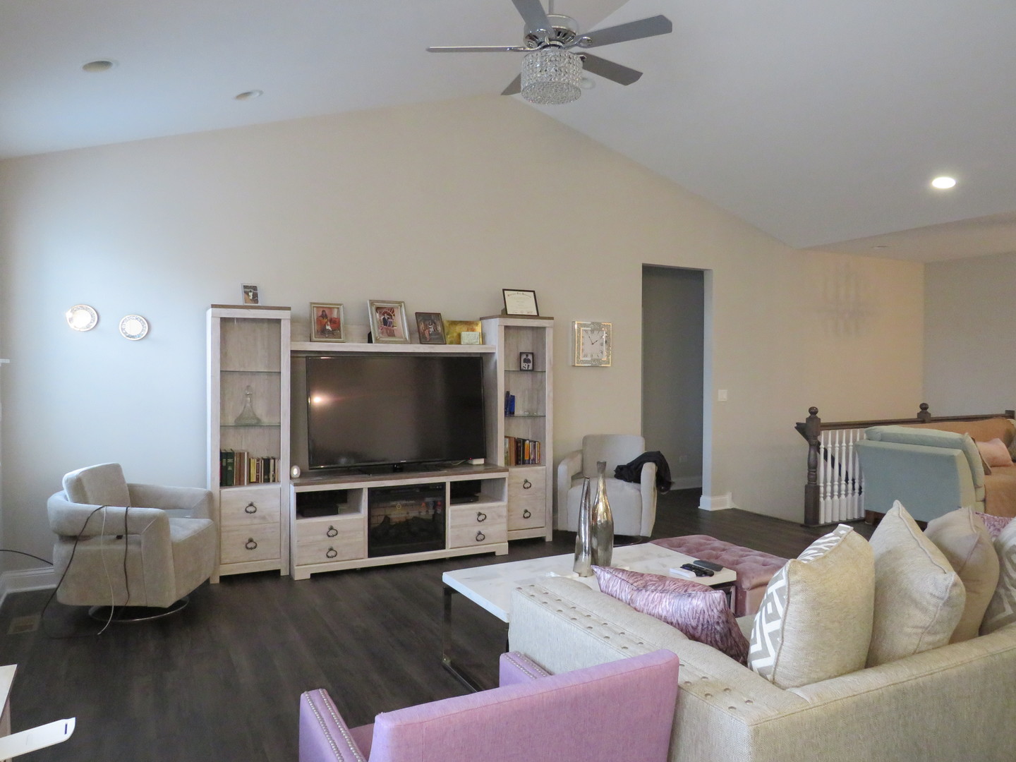 21407 Bay Tree Court Shorewood, IL 60404 - Photo 23 of 53 a living room with furniture and a flat screen tv