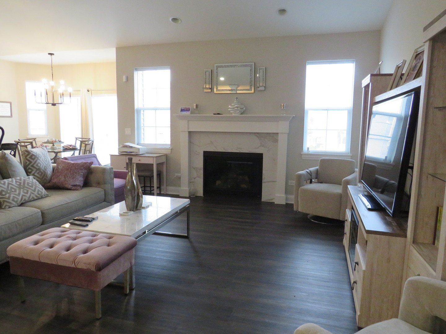 21407 Bay Tree Court Shorewood, IL 60404 - Photo 25 of 53 a living room with furniture and a fireplace