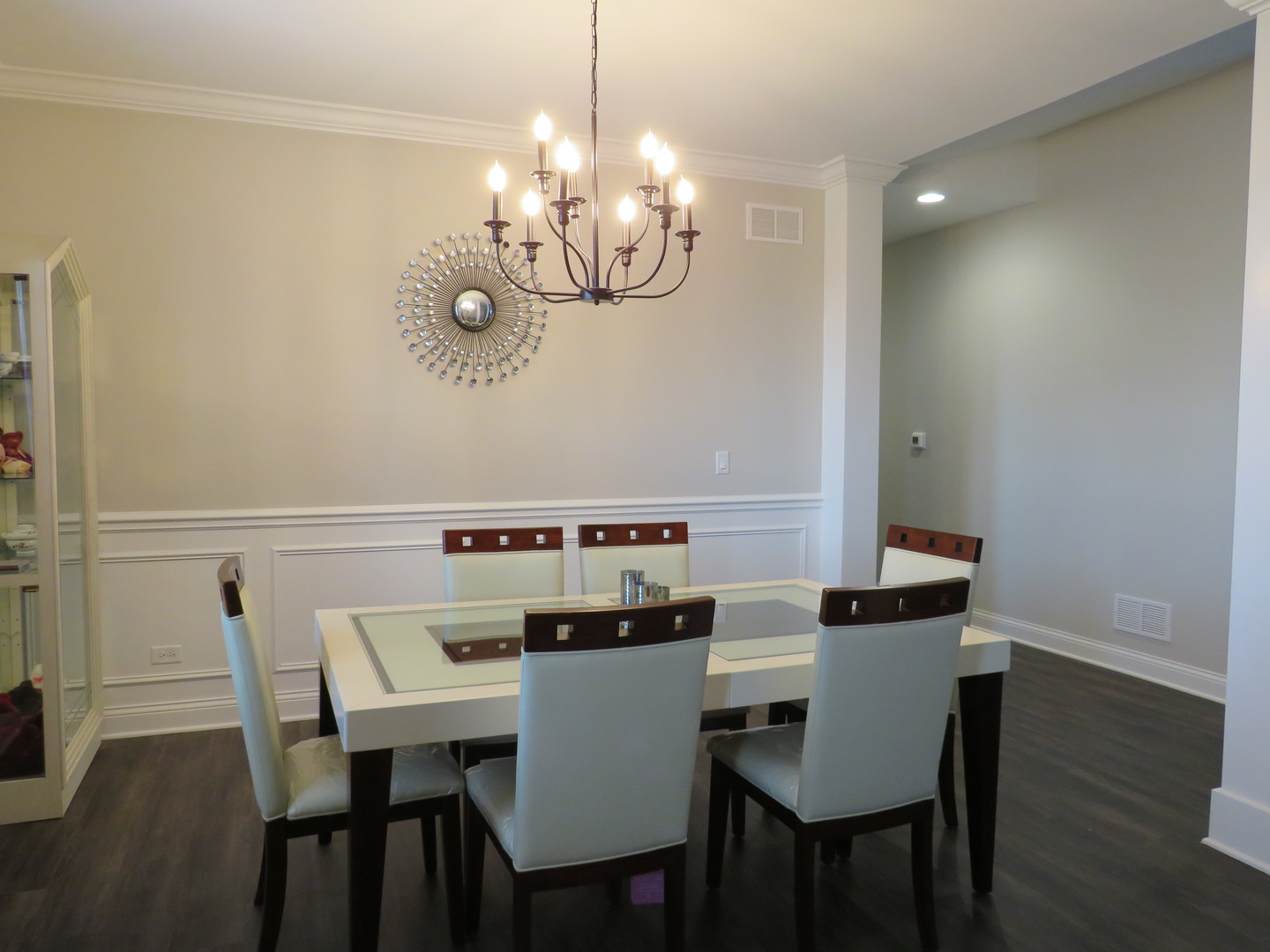 21407 Bay Tree Court Shorewood, IL 60404 - Photo 26 of 53 a view of a dining room with furniture and wooden floor