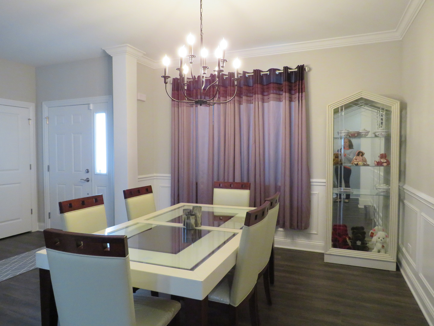 21407 Bay Tree Court Shorewood, IL 60404 - Photo 27 of 53 a view of a dining room with furniture and chandelier