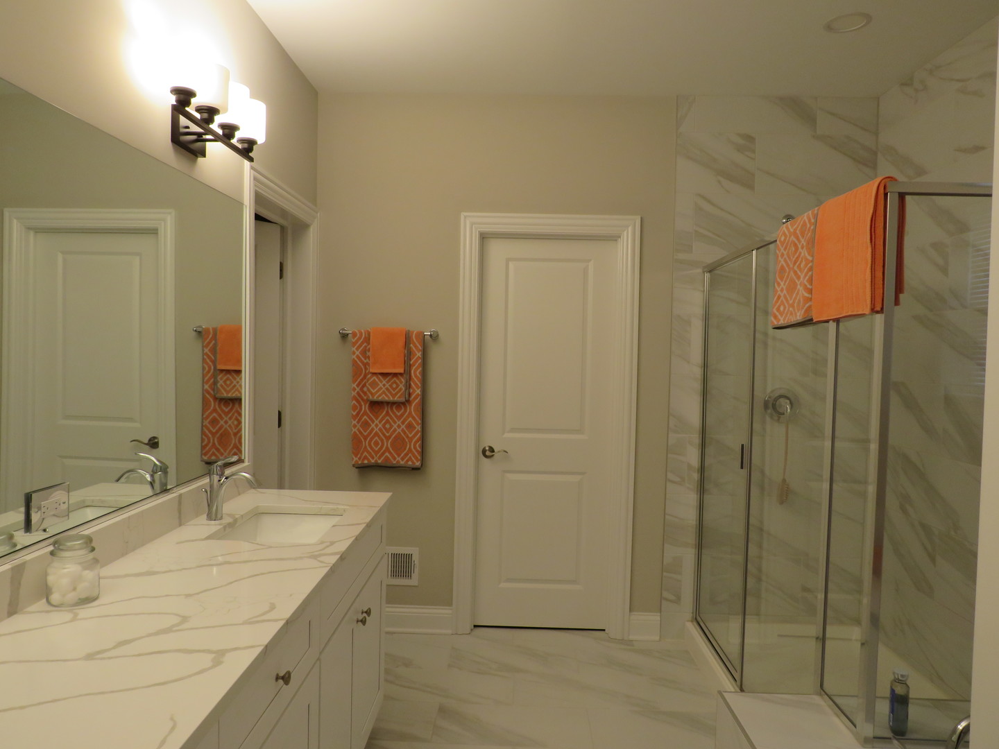 21407 Bay Tree Court Shorewood, IL 60404 - Photo 33 of 53 a bathroom with a granite countertop sink a mirror and shower