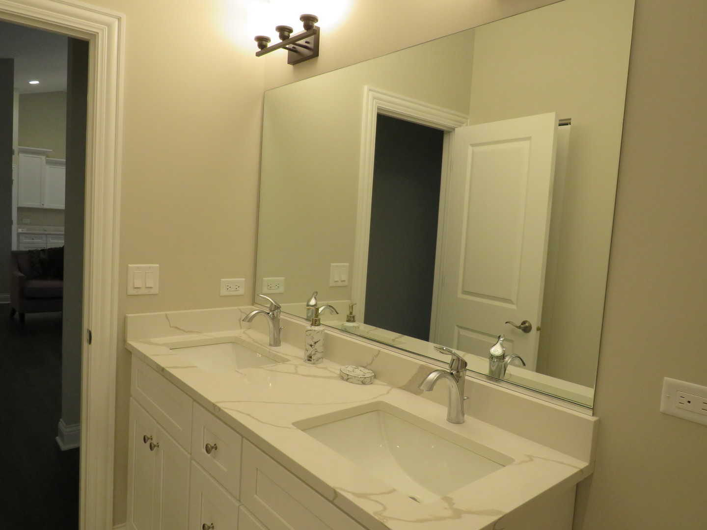 21407 Bay Tree Court Shorewood, IL 60404 - Photo 39 of 53 a bathroom with a sink and a mirror
