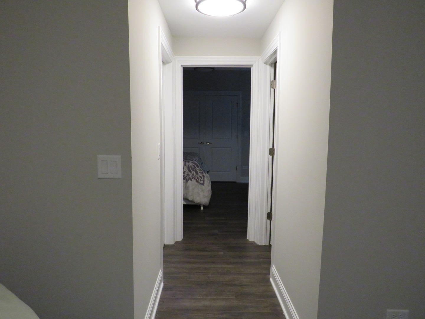 21407 Bay Tree Court Shorewood, IL 60404 - Photo 44 of 53 a view of a hallway with wooden floor and a hallway