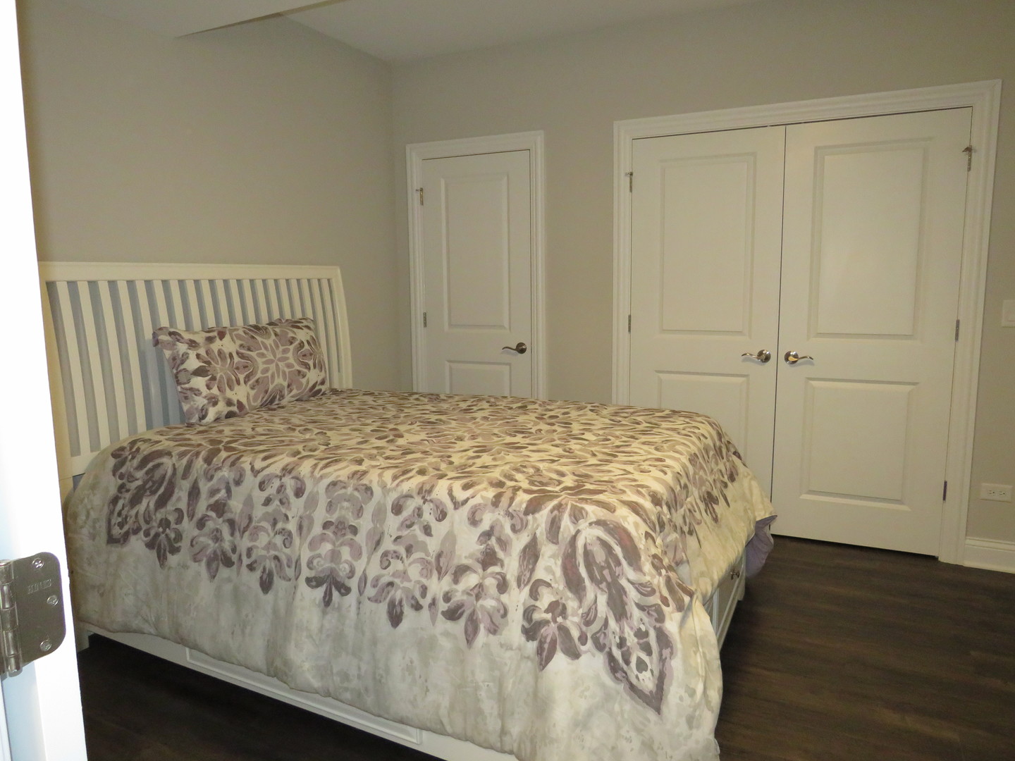 21407 Bay Tree Court Shorewood, IL 60404 - Photo 46 of 53 a bed sitting in a bedroom next to a cabinet