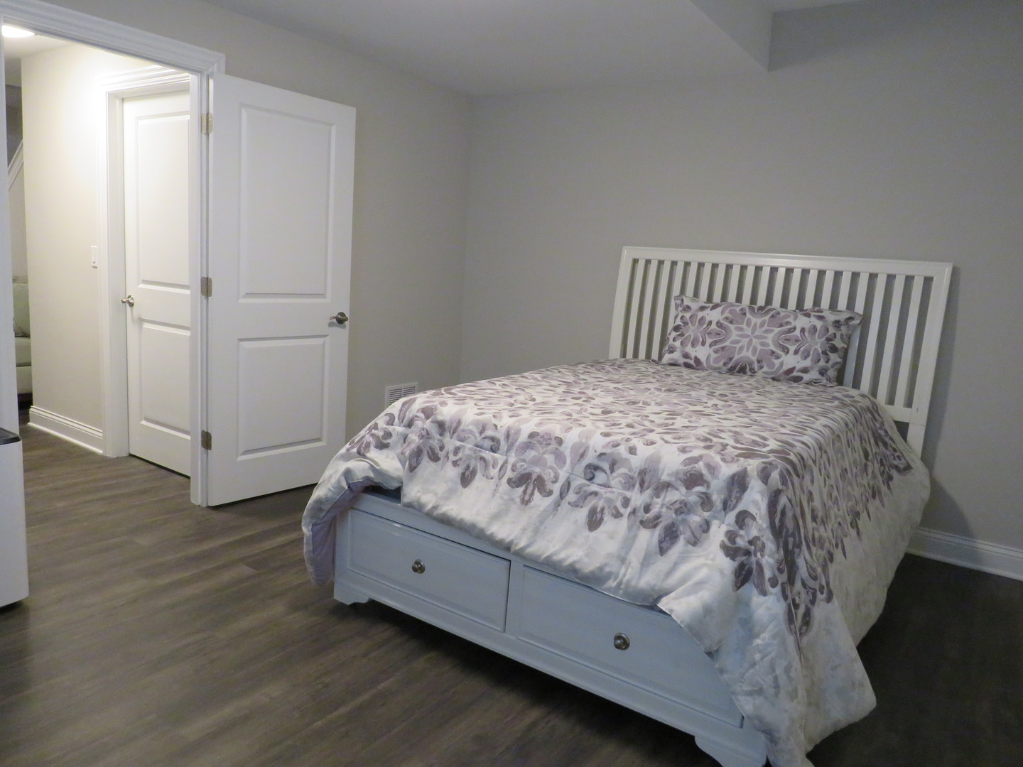 21407 Bay Tree Court Shorewood, IL 60404 - Photo 48 of 53 a bedroom with a bed and wooden floor