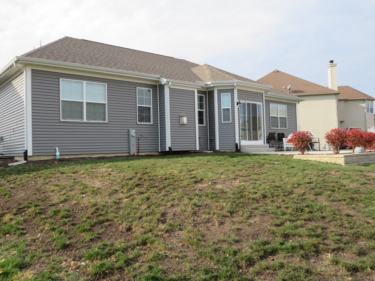 21407 Bay Tree Court Shorewood, IL 60404 - Photo 5 of 53 a front view of a house with garden