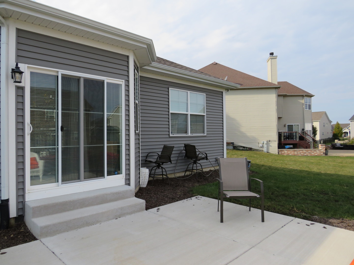 21407 Bay Tree Court Shorewood, IL 60404 - Photo 7 of 53 a view of a house with a backyard and a garden