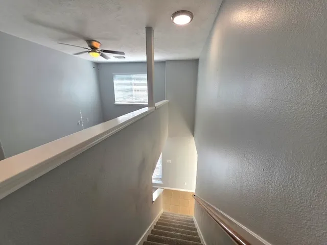 a bathroom with a tub sink and a mirror