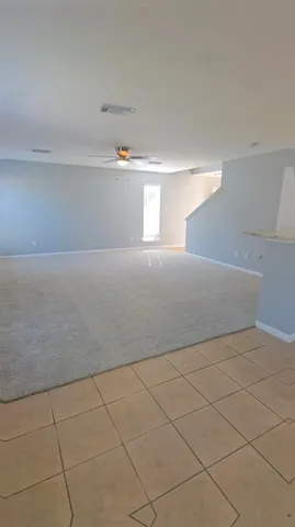 a view of a house with a big yard