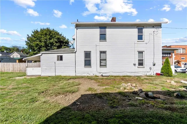 a view of a house with a big yard