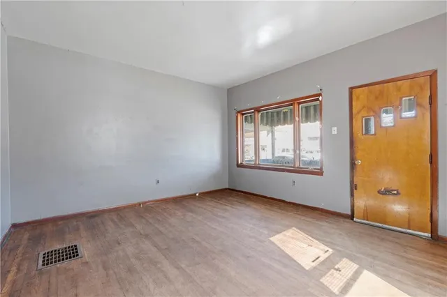 an empty room with windows