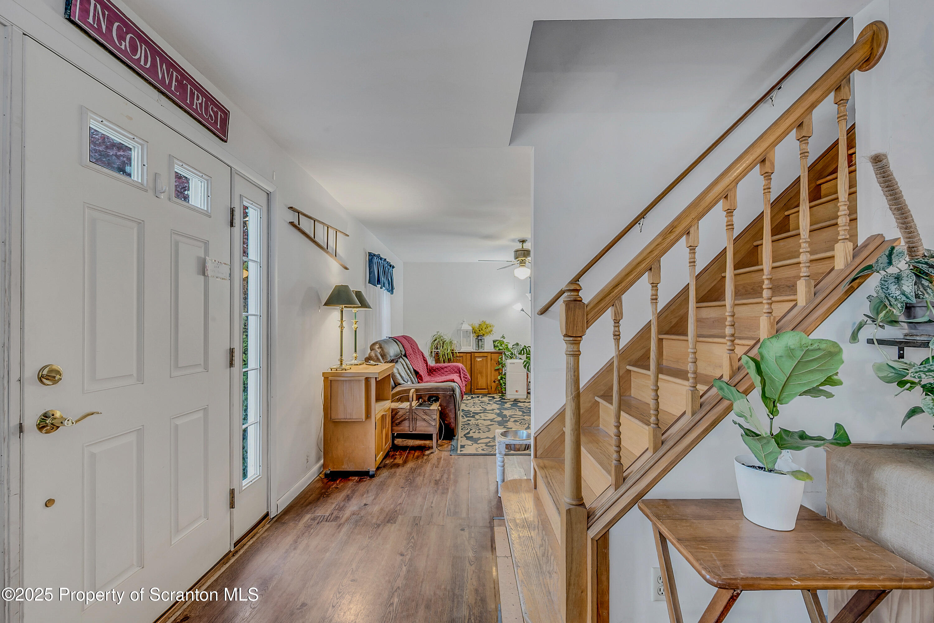 1001 Griggs Street Clarks Summit, PA 18411 - Photo 15 of 55 a view of an entryway with wooden floor and stairs