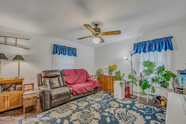 a kitchen with stainless steel appliances granite countertop a refrigerator and a stove