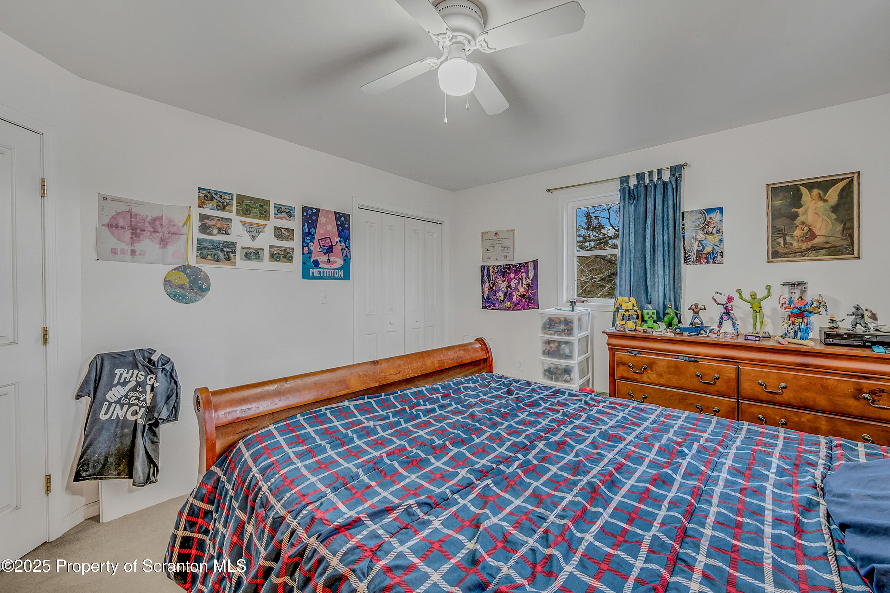 1001 Griggs Street Clarks Summit, PA 18411 - Photo 33 of 55 a bedroom with a bed and dresser
