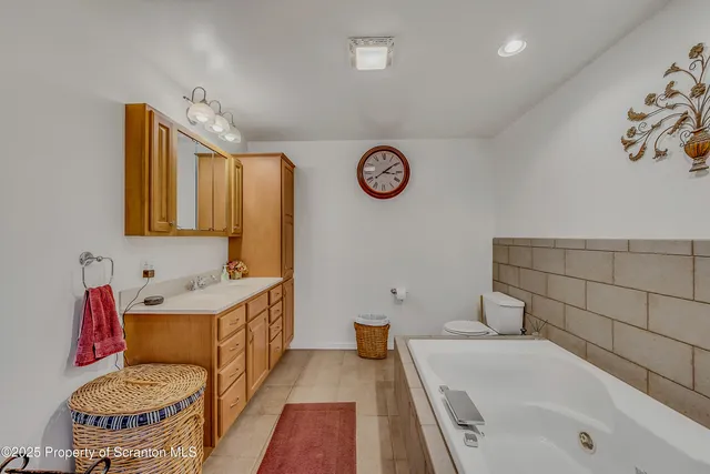 a bedroom with furniture and a table