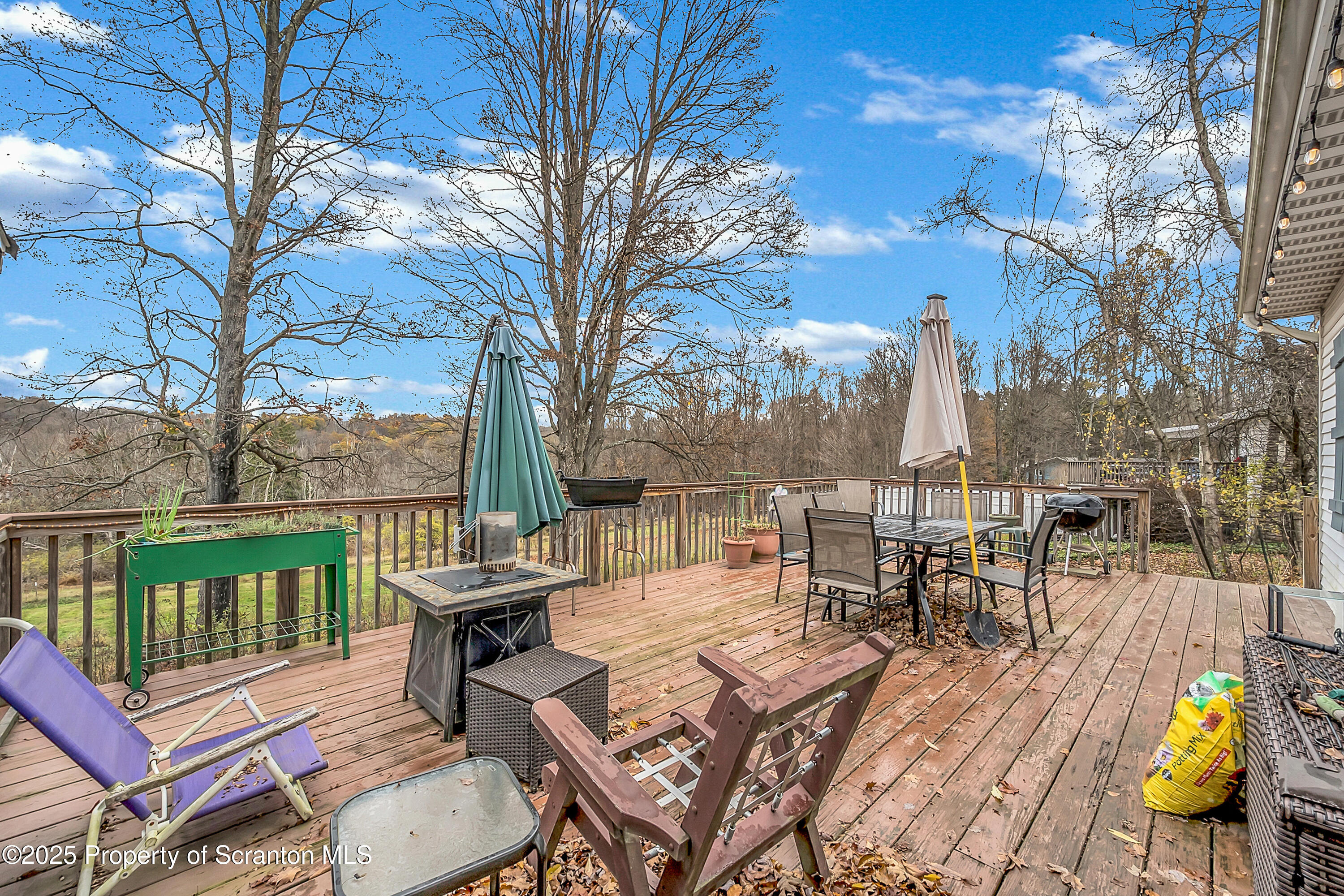 1001 Griggs Street Clarks Summit, PA 18411 - Photo 8 of 55 a view of a patio with iron fence