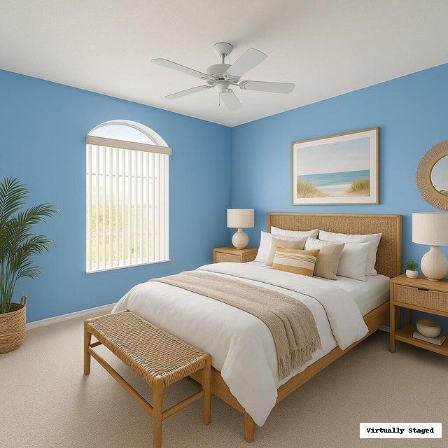 8918 Southeast Riverfront Terrace Jupiter, FL 33469 - Photo 23 of 43 a bedroom with a bed and window