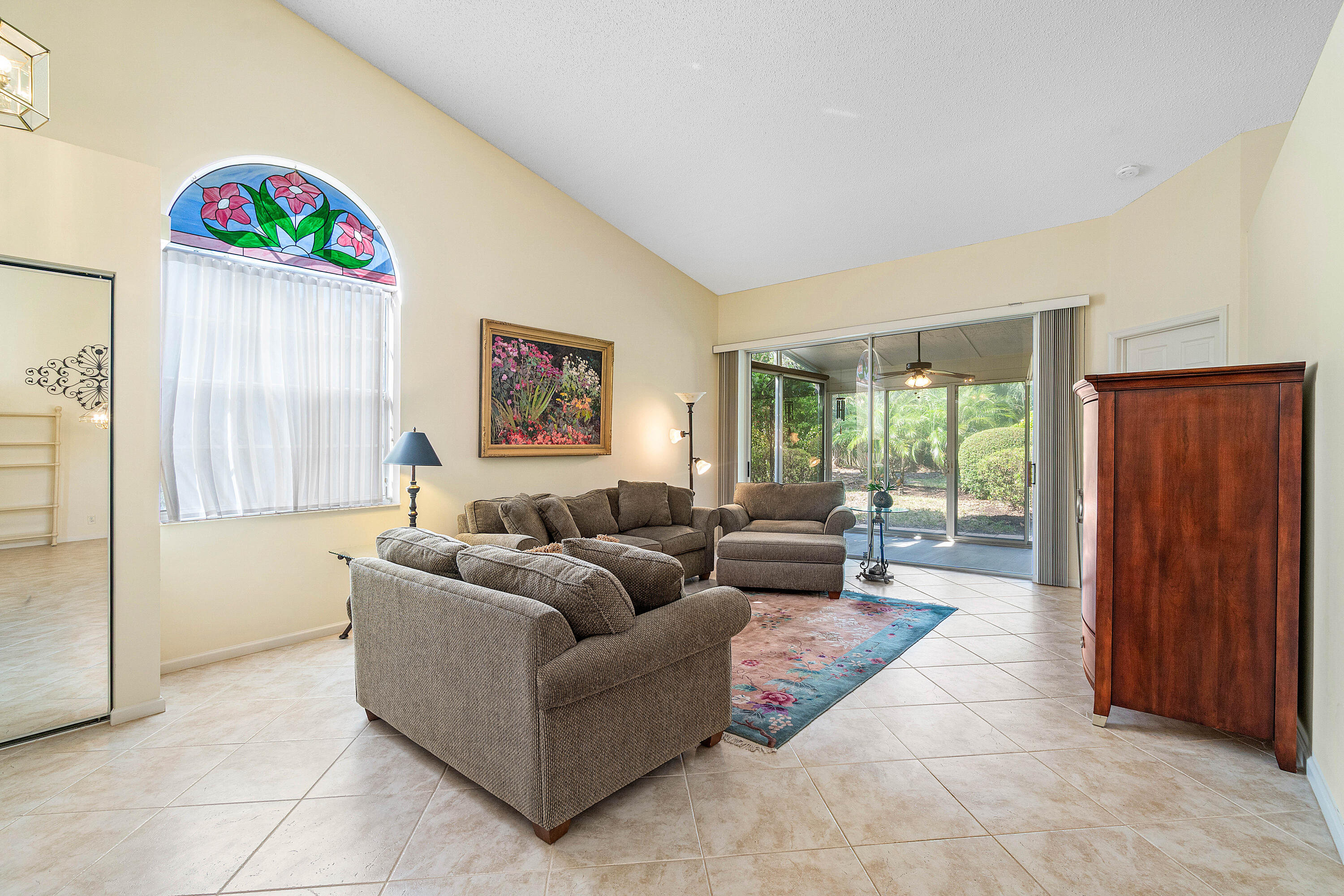 8918 Southeast Riverfront Terrace Jupiter, FL 33469 - Photo 4 of 43 a living room with furniture and a window