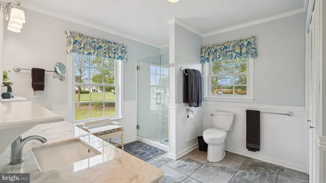 a bedroom with a bed and a table in it