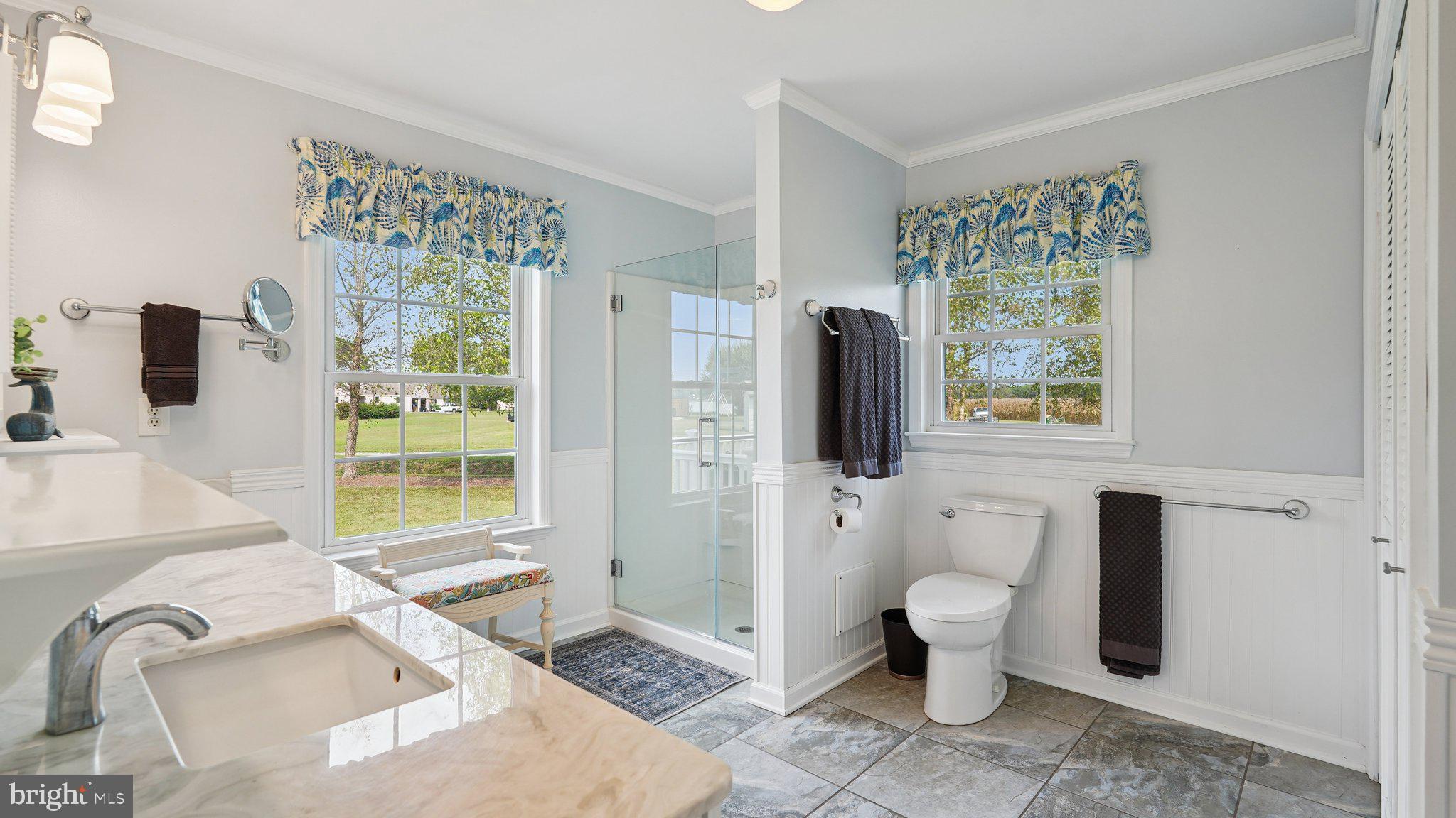4387 Coles Point Road Hague, VA 22469 - Photo 19 of 39 a bathroom with a sink toilet and shower