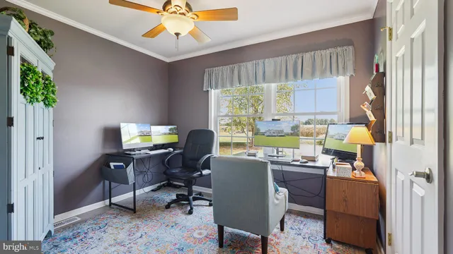 a kitchen with a refrigerator and cabinets