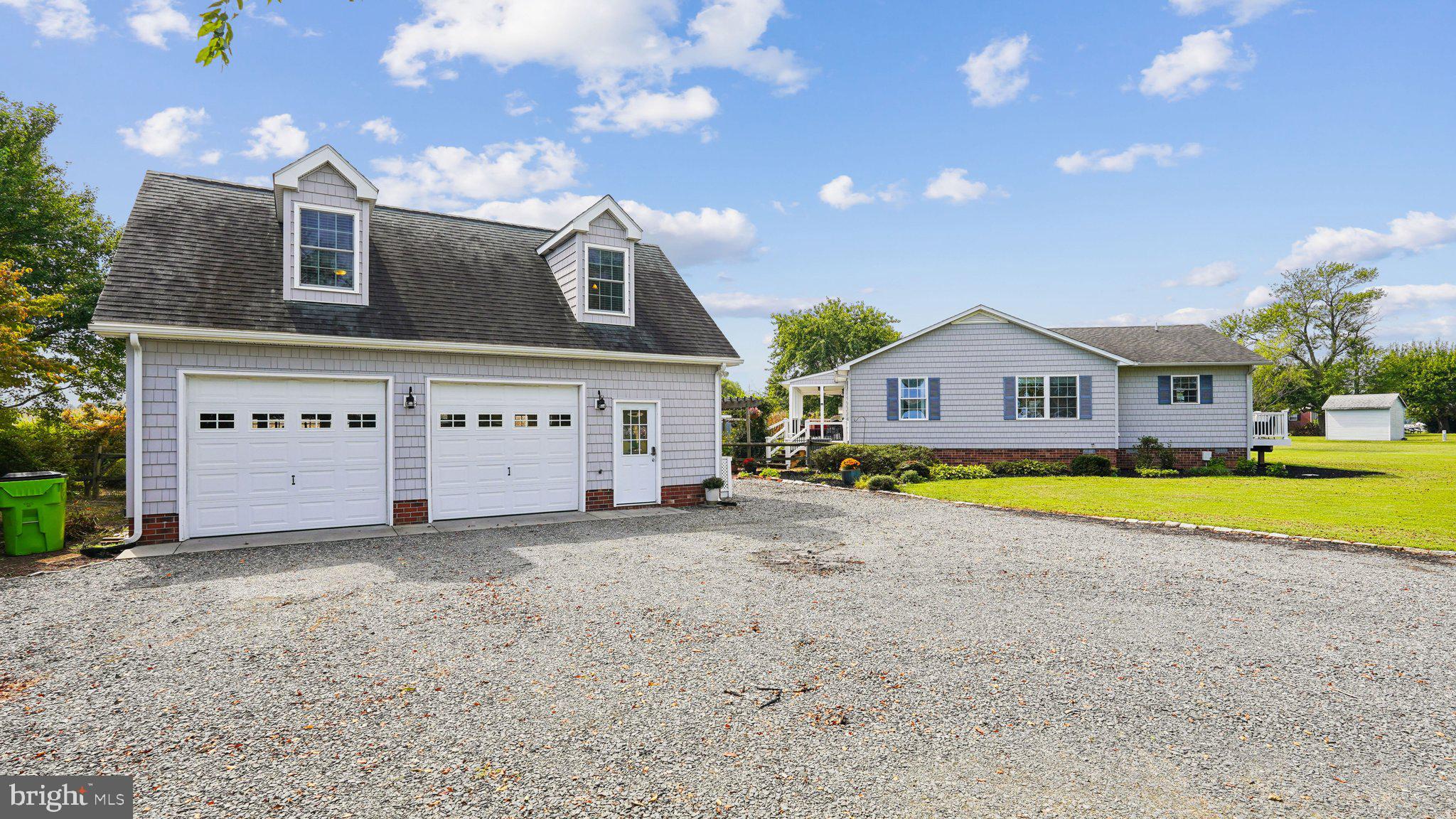 4387 Coles Point Road Hague, VA 22469 - Photo 27 of 39 a front view of house with yard and swimming pool