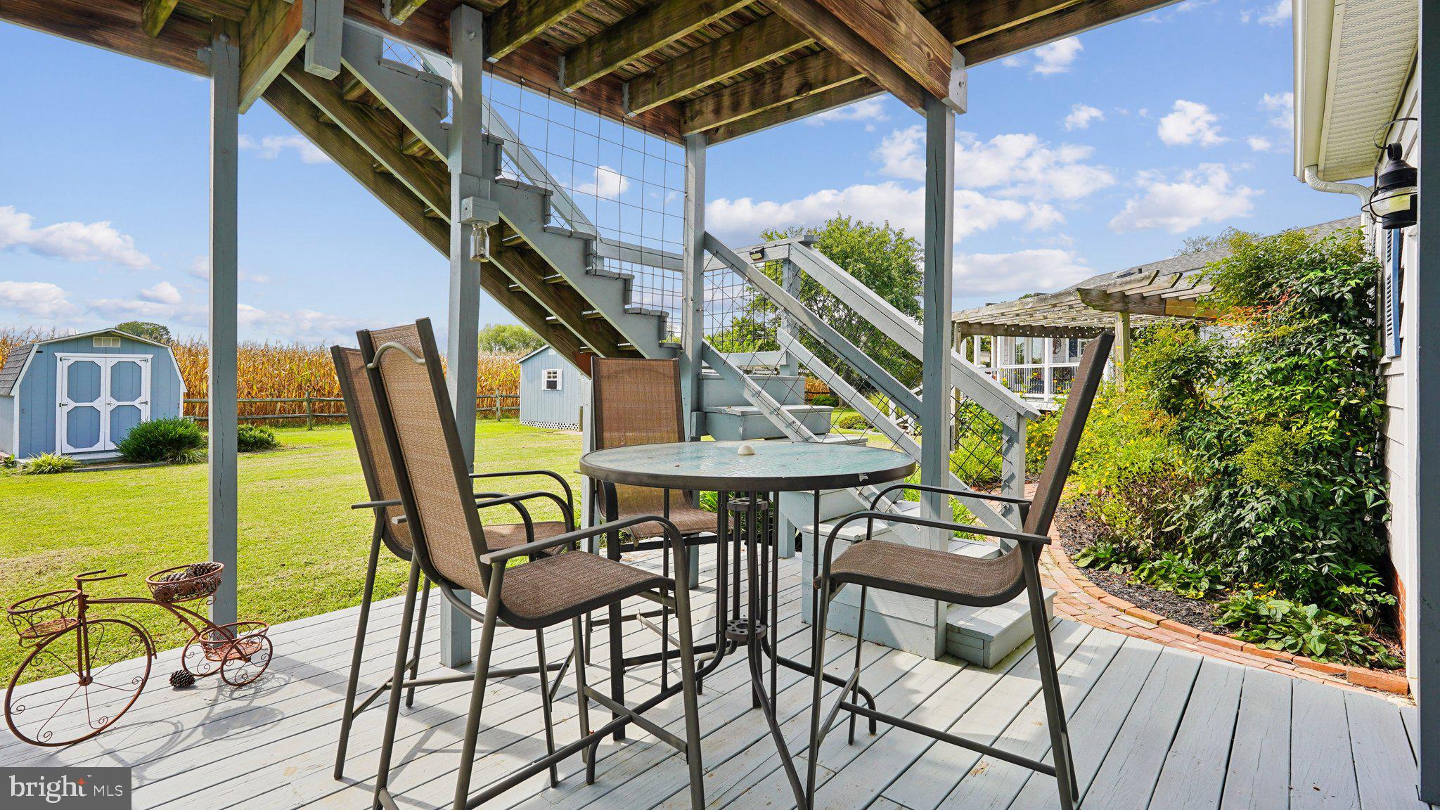 4387 Coles Point Road Hague, VA 22469 - Photo 28 of 39 a view of an chairs and table in the balcony