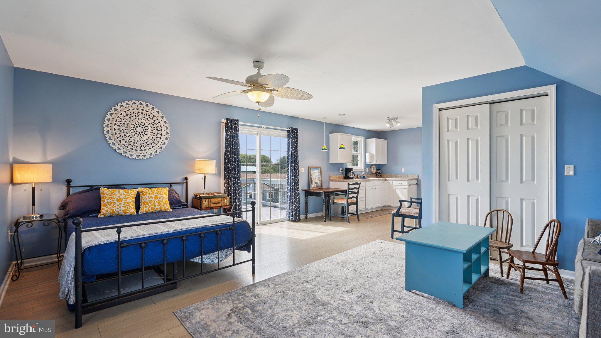 4387 Coles Point Road Hague, VA 22469 - Photo 29 of 39 a living room with furniture and a table