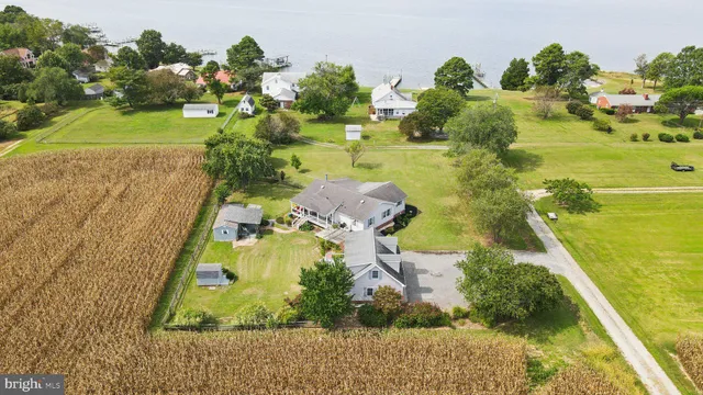 a dining room with furniture chandelier