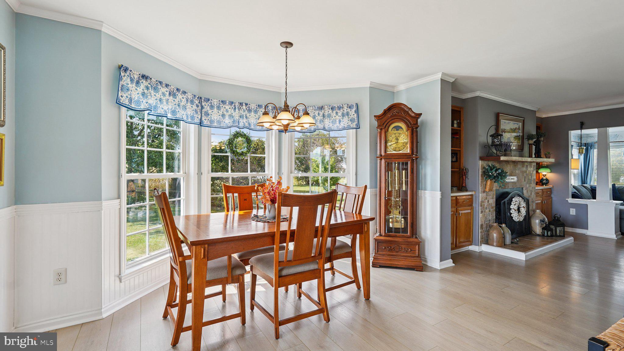 4387 Coles Point Road Hague, VA 22469 - Photo 9 of 39 a view of a dining room with furniture window and wooden floor