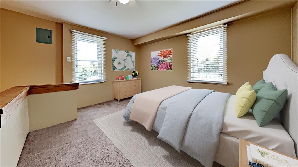 8150 Peebles Road Pittsburgh, PA 15237 - Photo 15 of 25 a bed sitting in a bedroom next to a window