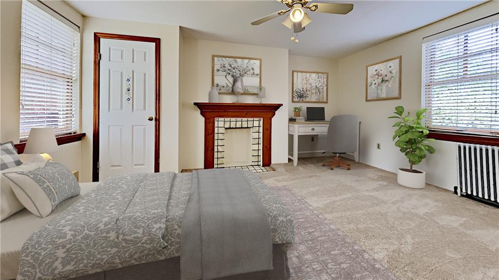 8150 Peebles Road Pittsburgh, PA 15237 - Photo 16 of 25 a bedroom with a bed and a chandelier
