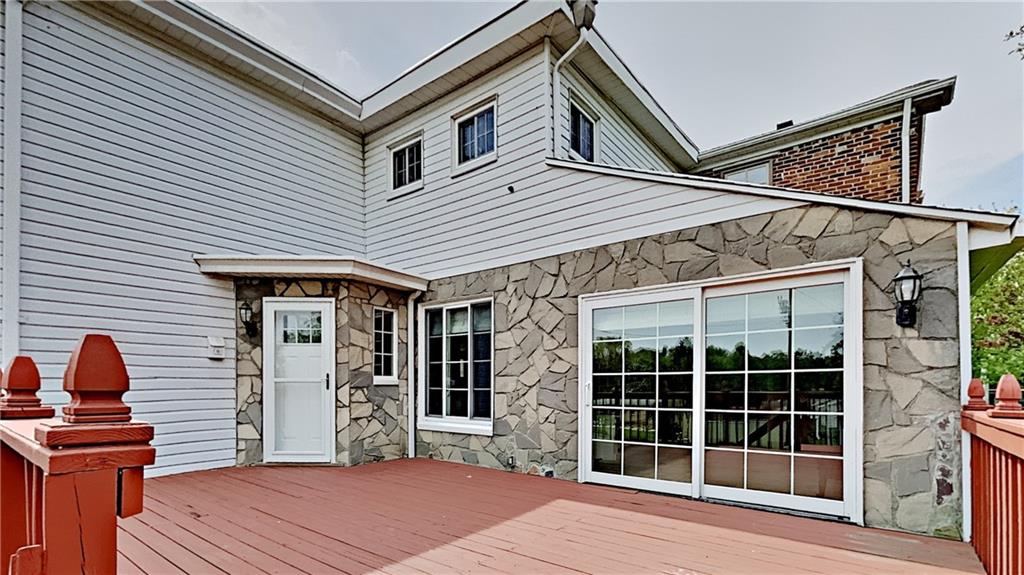 8150 Peebles Road Pittsburgh, PA 15237 - Photo 20 of 25 a front view of a house with a yard