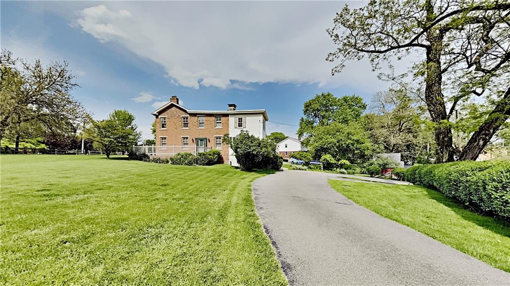 8150 Peebles Road Pittsburgh, PA 15237 - Photo 23 of 25 a front view of a house with garden