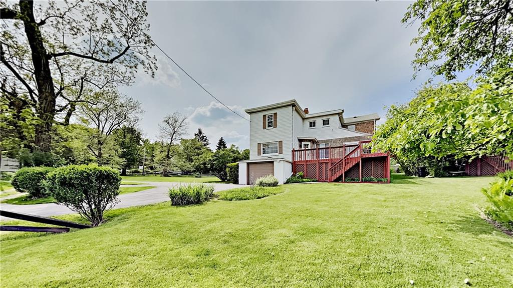 8150 Peebles Road Pittsburgh, PA 15237 - Photo 25 of 25 a view of a house with a big yard and potted plants
