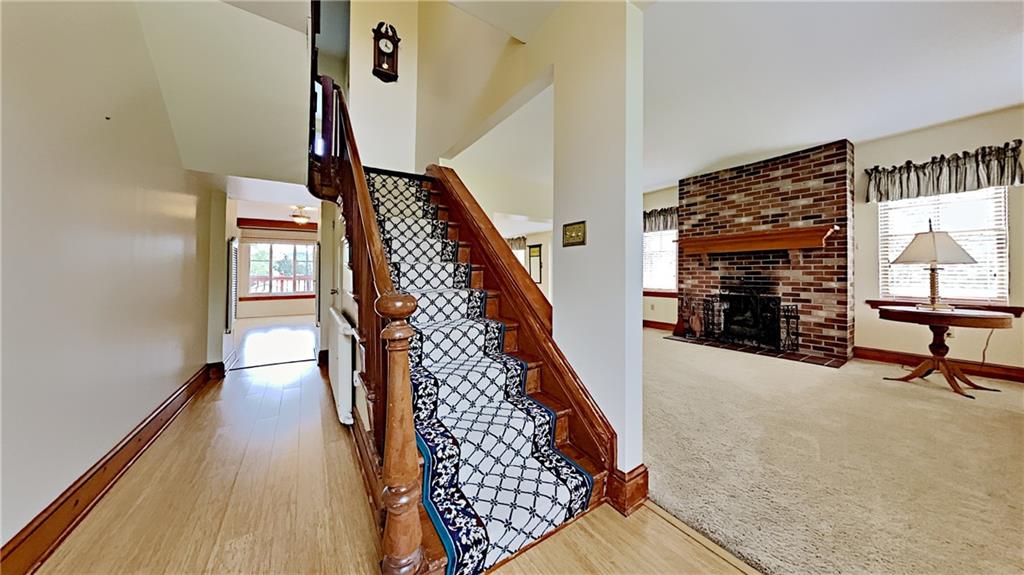 8150 Peebles Road Pittsburgh, PA 15237 - Photo 4 of 25 a view of entryway and hall with wooden floor