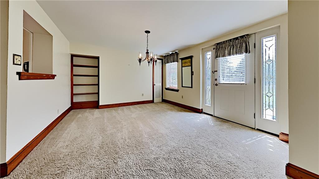 8150 Peebles Road Pittsburgh, PA 15237 - Photo 6 of 25 an empty room with windows and closet