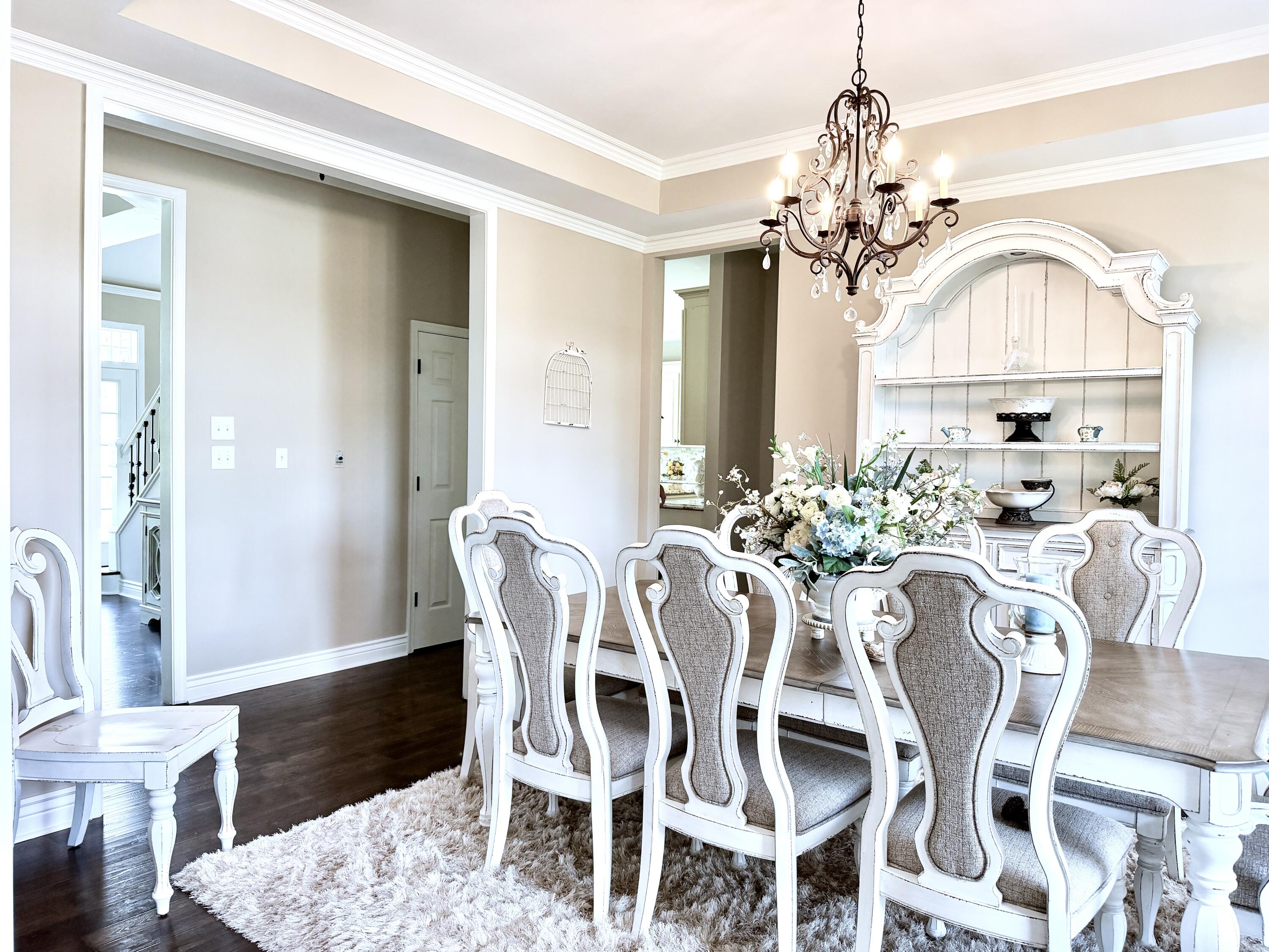 2844 Fairview Church Road Huddleston, VA 24104 - Photo 16 of 101 a view of a dining room with furniture a chandelier and wooden floor