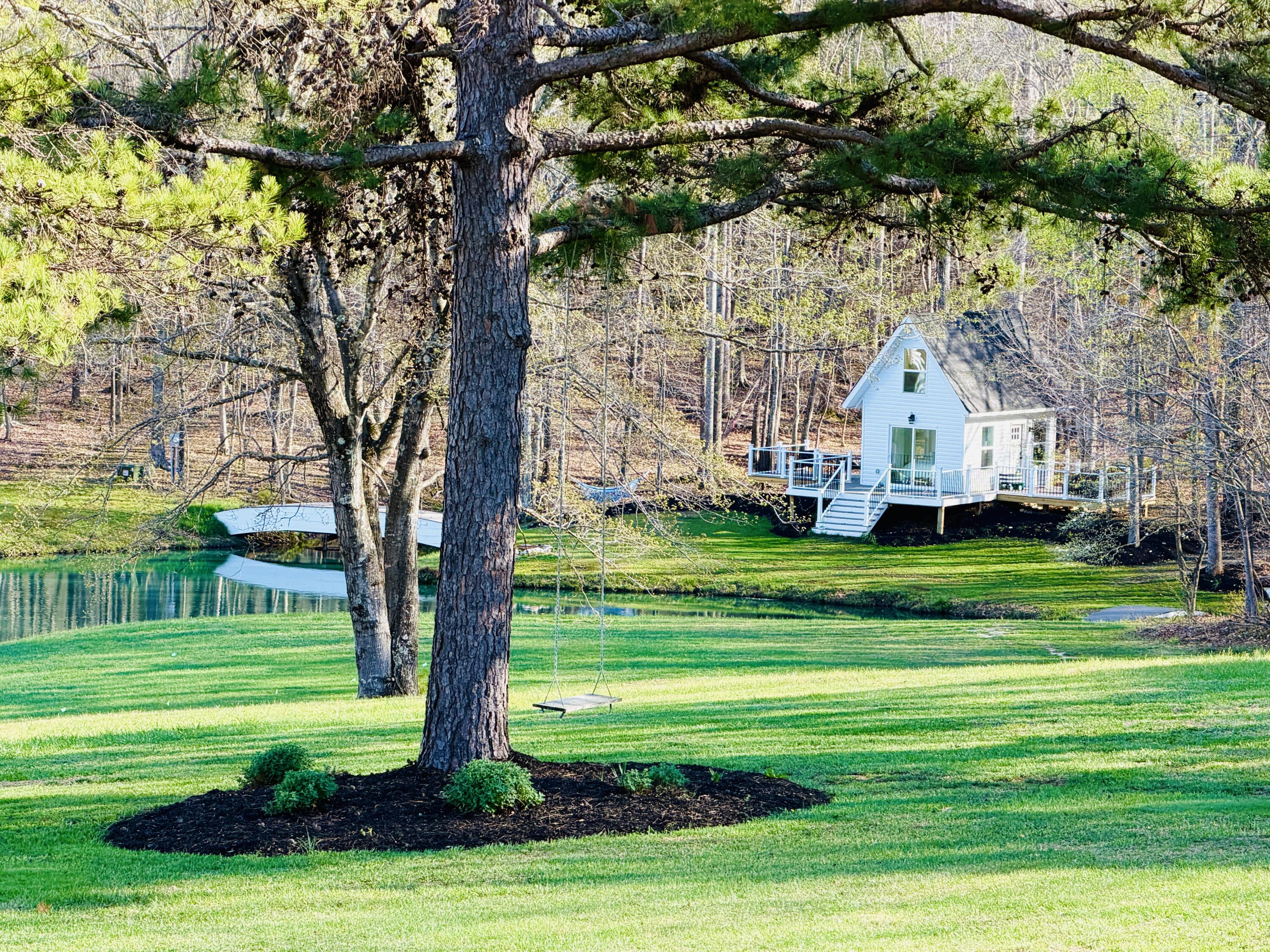 2844 Fairview Church Road Huddleston, VA 24104 - Photo 44 of 101 a front view of a house with a yard table and chairs