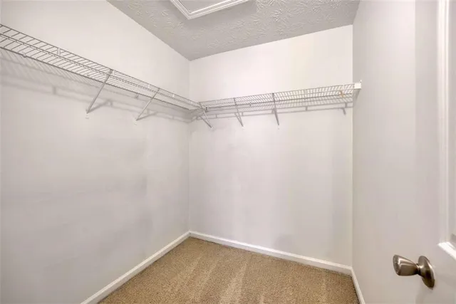 a view of a house with backyard porch and sitting area