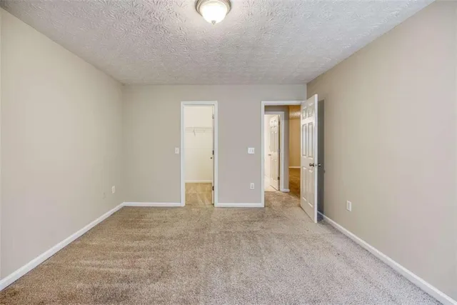 an aerial view of residential houses with lake view