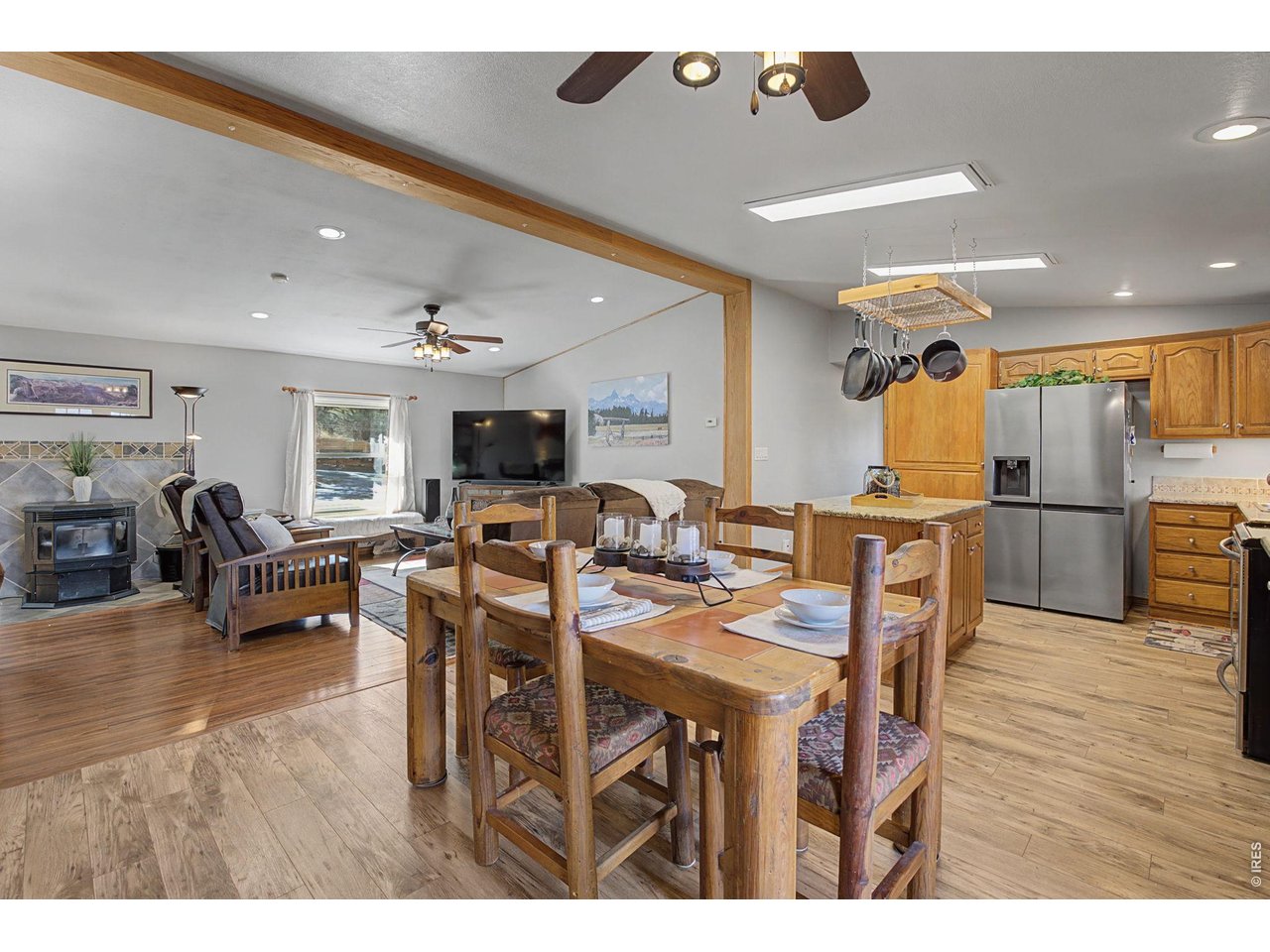 8701 Rock Hill Road Loveland, CO 80537 - Photo 14 of 50 a view of a dining room with furniture