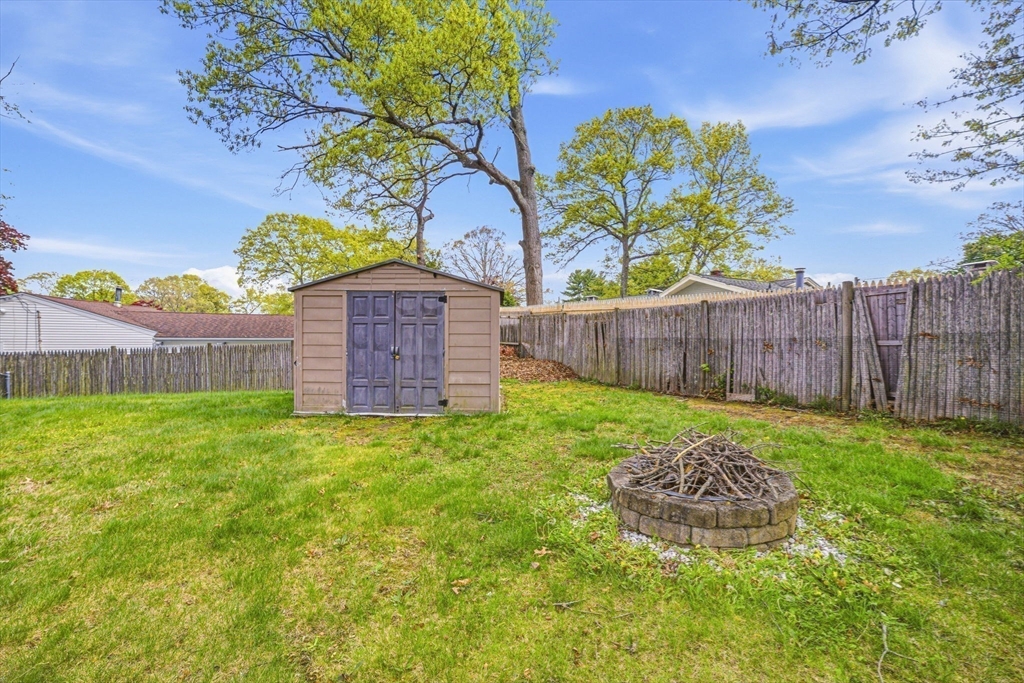 157 Errol Road Brockton, MA 02302 - Photo 7 of 34 a view of a backyard with a garden