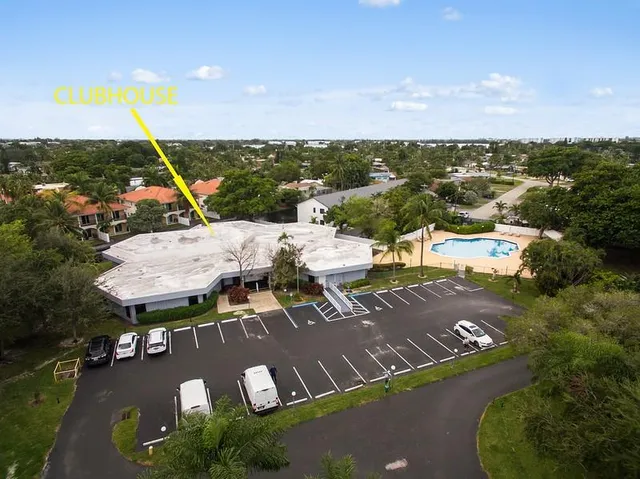 an aerial view of a house with a ocean view