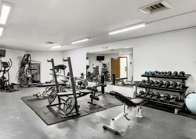 a view of a room with gym equipment
