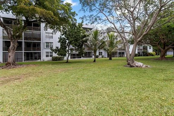 a view of a house with a street