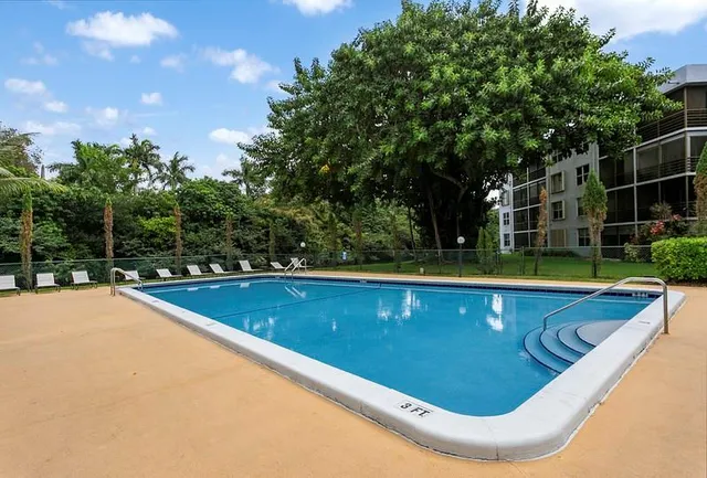 a view of outdoor space and swimming pool