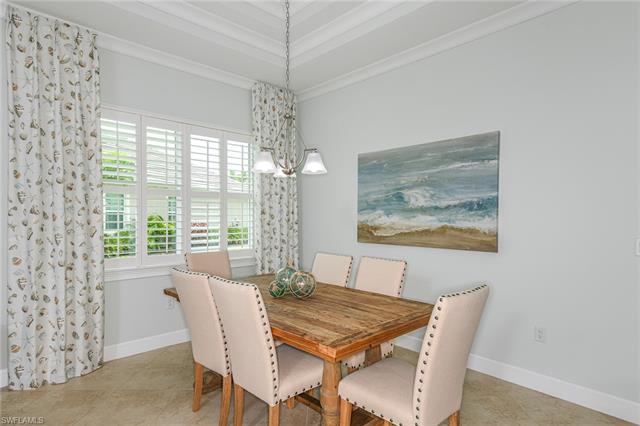 8777 Yucatan Court Naples, FL 34113 - Photo 12 of 41 a view of a dining room with furniture window and outside view